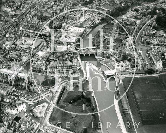 Aerial view of Bath Abbey, Empire Hotel, Pulteney Bridge and weir 1971