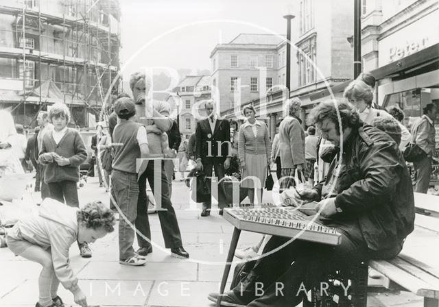 Jim Couza playing his hammered dulcimer in Union Street, Bath 1984