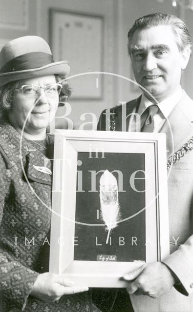 Lilian Lowe presenting the Mayor of Bath a painting of the Coat of Arms of Bath on a Feather 1975