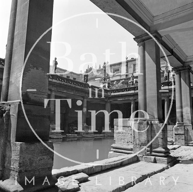 View from the Roman Baths towards the arch over York Street, Bath c.1977