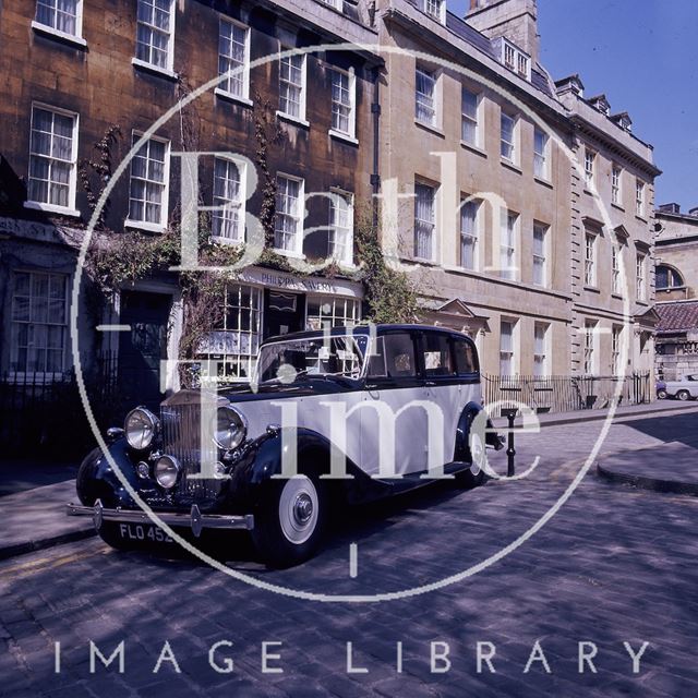 A Rolls Royce limousine outside Philippa Savery, antiques, Abbey Street, Bath c.1975