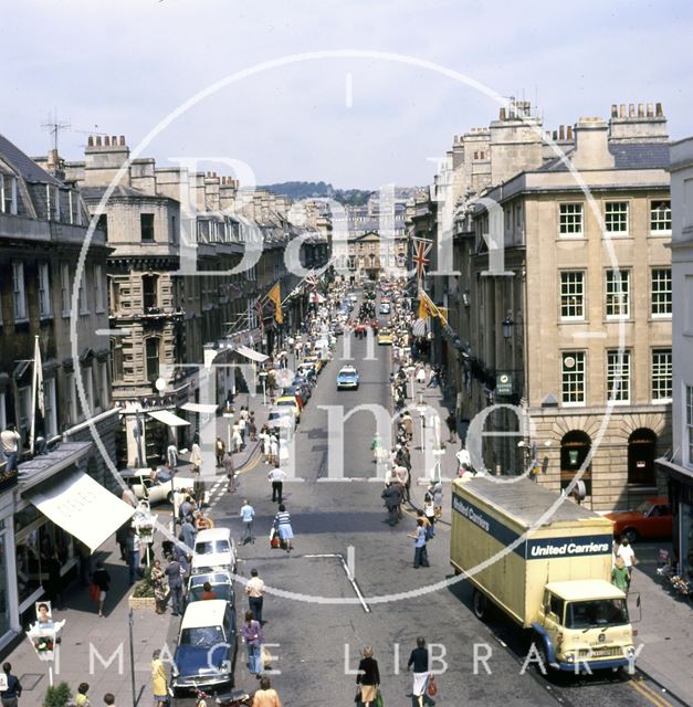 A procession down Milsom Street, Bath led by a panda car 1977