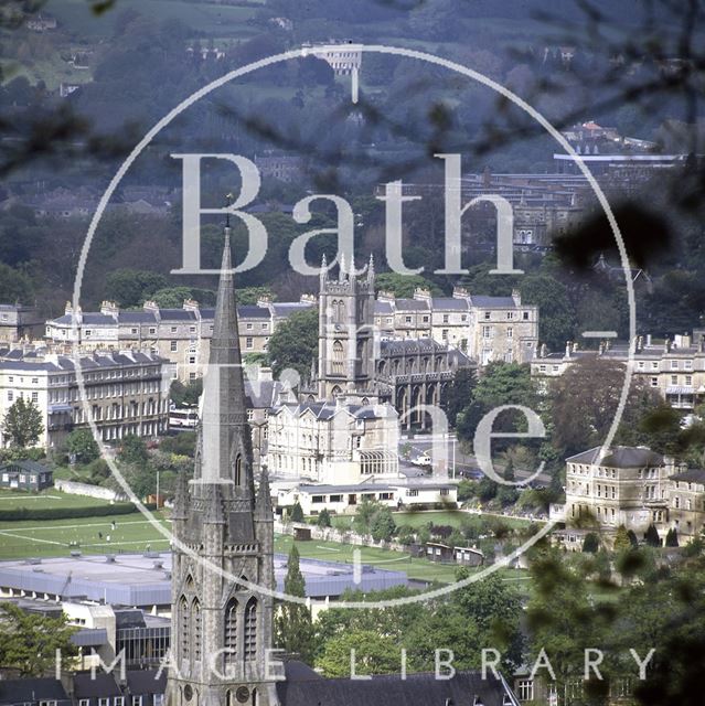 The spire of St. John the Evangelist Church with St. Mary's Church, Bathwick in the background, Bath c.1982