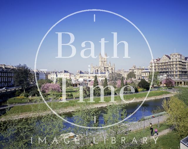 A spring view of Bath Abbey from across the River Avon and Parade Gardens c.1980