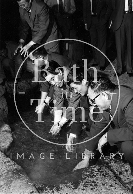 A delegation of tourists from the far east at the Roman Baths, Bath c.1973