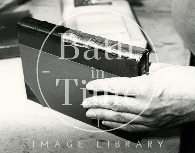 At work at Cedric Chivers bookbinders, Portway House, Combe Park, Bath 1983