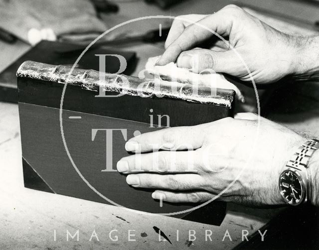 At work at Cedric Chivers bookbinders, Portway House, Combe Park, Bath 1983