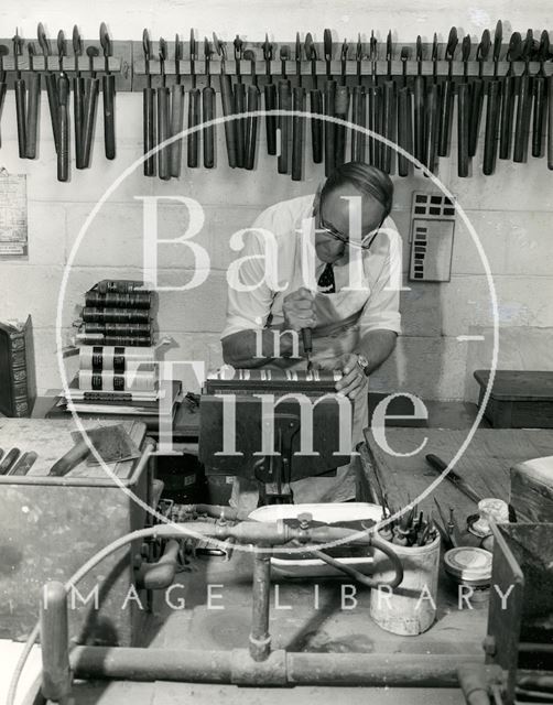 At work at Cedric Chivers bookbinders, Portway House, Combe Park, Bath 1983