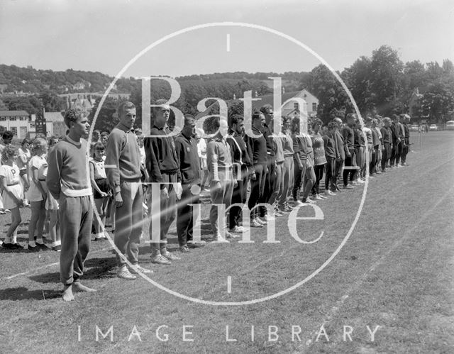 Athletics assemble at the Recreation Ground before a sporting event, Bath c.1963