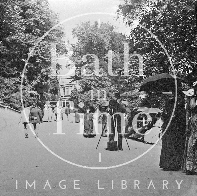 A gentleman photographer and promenaders, Sydney Gardens, Bath c.1900