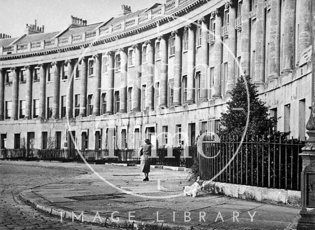 A lady walking her dog on Royal Crescent, Bath c.1940