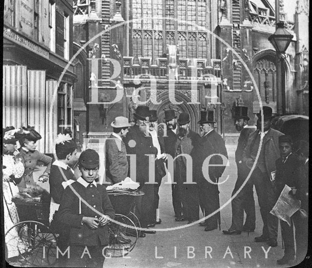 A group of smartly dressed people in Abbey Church Yard, Bath c.1880