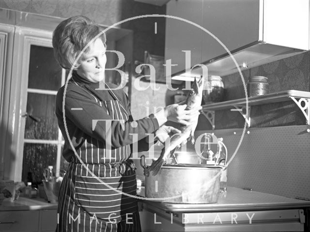 Mary Berry cooking fish at her home in Bath 1971