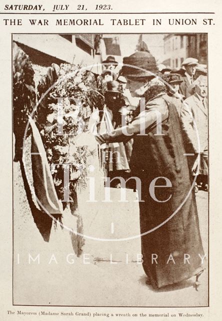 The Mayoress Sarah Grand placing a wreath on the War Memorial, Union Street, Bath 1923