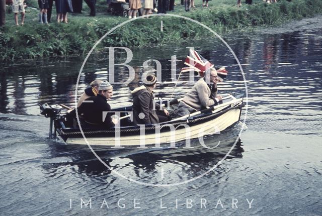 Men in a small boat powered by a Seagull outboard on the Kennet and Avon Canal near Dundas, Monkton Combe c.1960