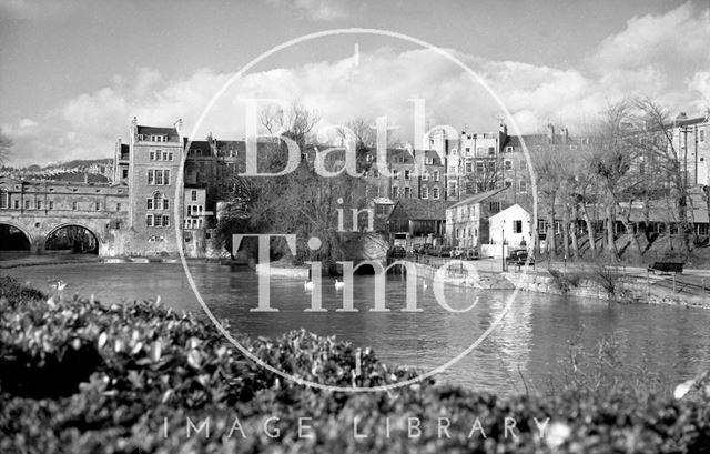 View of the ruined Bathwick Mill and Pulteney Bridge from Parade Gardens, Bath c.1960