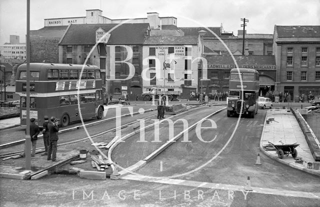 The first vehicles crossing the newly opened Churchill Bridge, Bath 1965