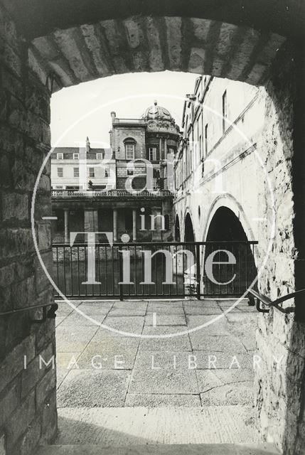 Looking out under the entrance to the terrace beside Pulteney Bridge, Bath 1972