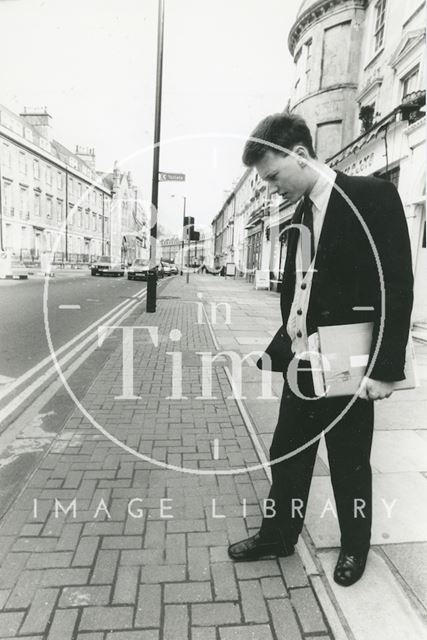 Christopher Woodward, Director of the Building of Bath Museum inspecting the pavement 1992