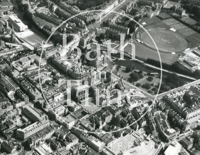 Aerial photograph of Bath showing a northeasterly view of the Empire Hotel, the River Avon, Pulteney Bridge and the Recreation Ground 1974