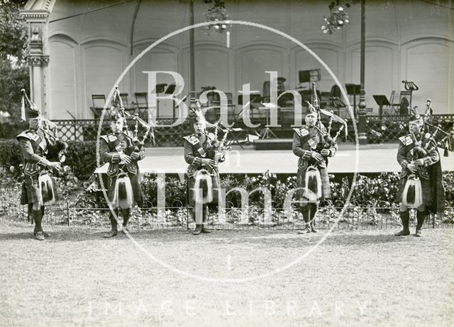 Highland pipers at the bandstand, Royal Victoria Park, Bath 1929