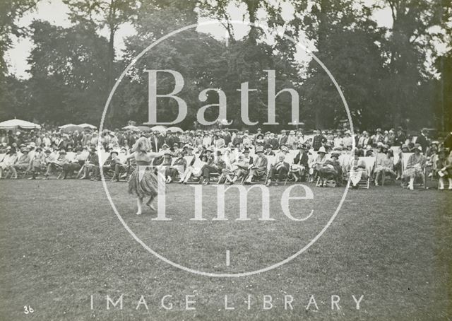 Attendees being entertained by a dancer at the mayoral garden party, Royal Victoria Park, Bath 1929