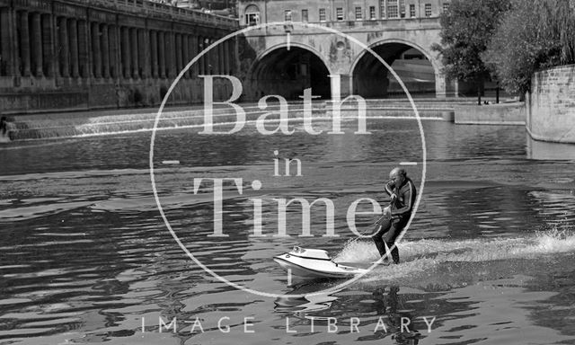 Motorised surfboard at Pulteney Weir, Bath 1975