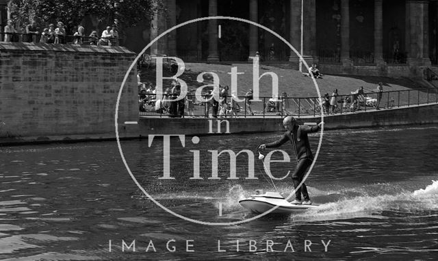 Motorised surfboard at Pulteney Weir, Bath 1975