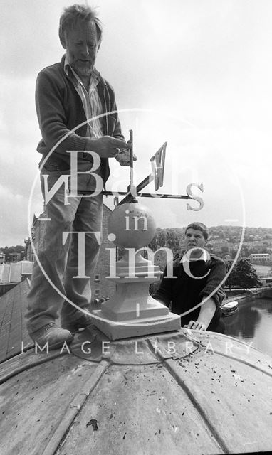 Affixing the weather vane on Pulteney Bridge, Bath 1992