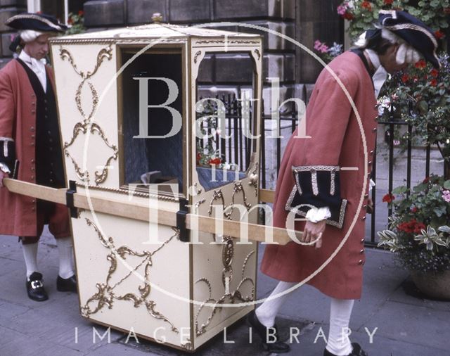 A sedan chair outside the Pump Room, Bath c.1970