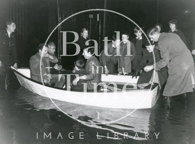 Rescuing a family by rowing boat from the Bath Floods 1960