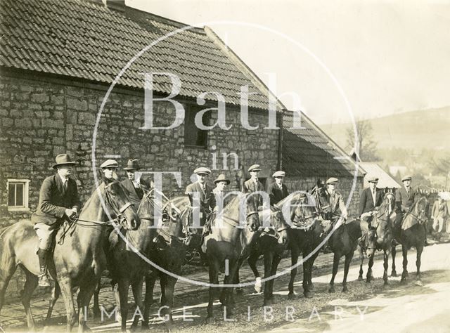 A group of men on horses outside the George Inn, Bathampton 1927