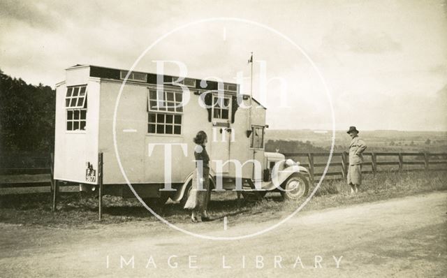 A homemade motorhome on a touring holiday 1930s