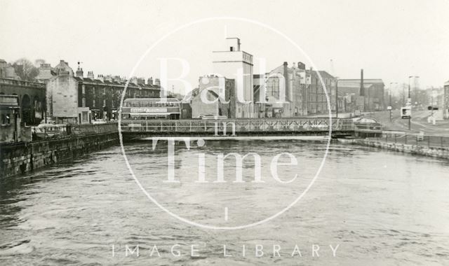 The temporary Bailey bridge across the River Avon, Bath during the floods c.1963