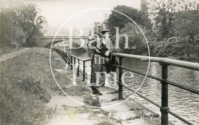 Man smoking a pipe beside the River Avon near North Parade Bridge, Bath c.1948