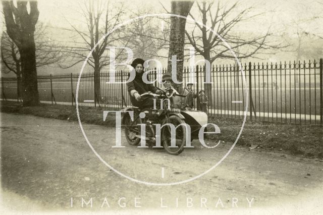 Two ladies pose with a motorcycle sidecar combination, possibly beside Henrietta Park?, Bath c.1930