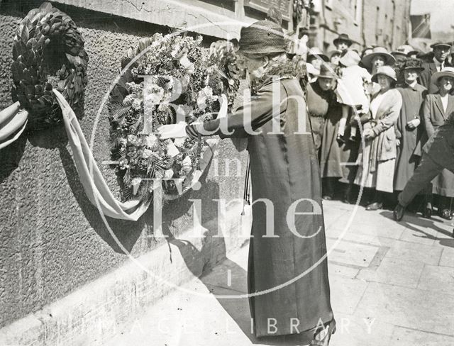 Mayoress Madame Sarah Grand placing wreath on the War memorial, Union Street, Bath 1923