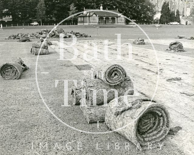 The turf being lifted from the cricket square on the Recreation Ground, Bath 1982