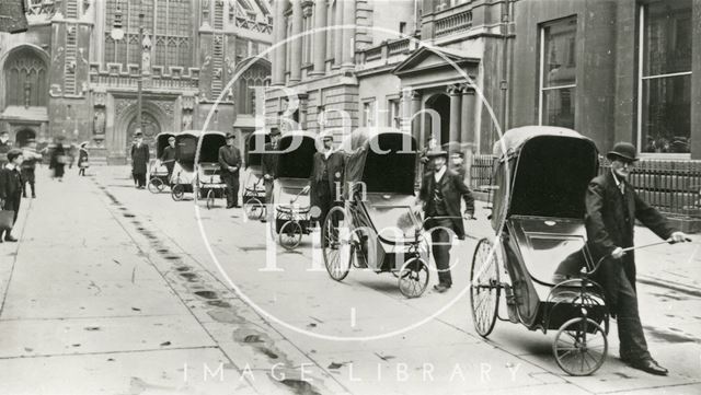 Bath chairs outside the Pump Room in Abbey Church Yard, Bath c.1907