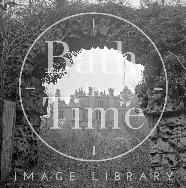 A view of Battlefields House, Lansdown near Bath through a rustic stone archway 1972