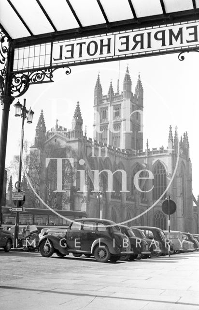 View of Bath Abbey from under the canopy of the Empire Hotel, Orange Grove c.1950