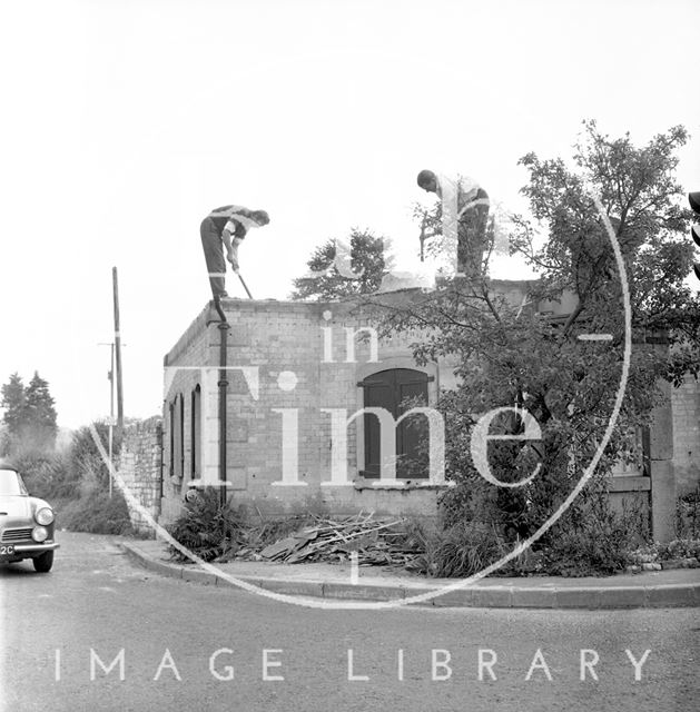 Demolishing the Newton Turnpike building near Bath c.1964