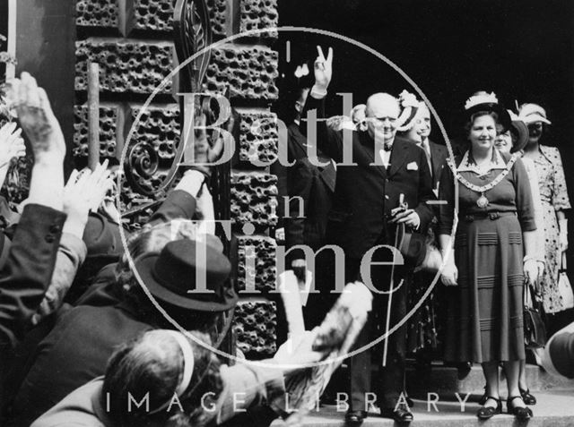 Winston Churchill gives the Victory salute outside the Guildhall, Bath 1950