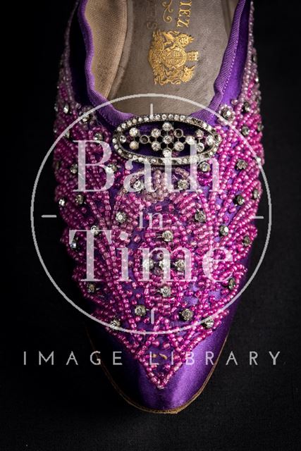 Purple silk satin shoe embroidered with glass beads and diamanté, 1898