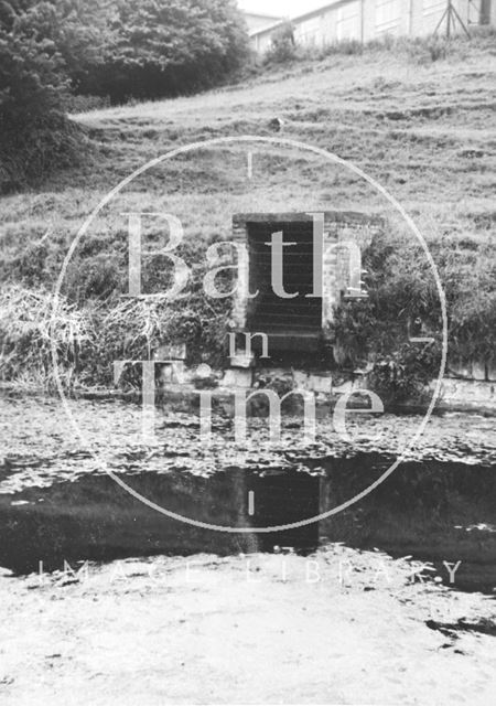 Surface water discharge from Admiralty Buildings on south bank of canal, Bathwick, Bath 1956