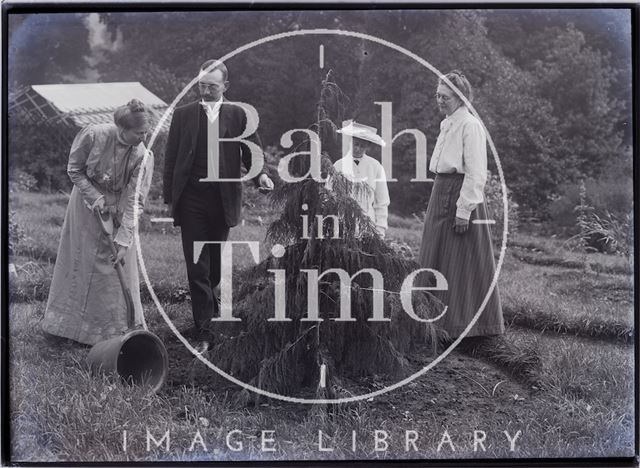 Emily, William and Mary Blathwayt with Mary Howey planting a tree 1910