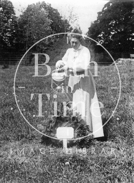 Emily Blathwayt watering tree 1909