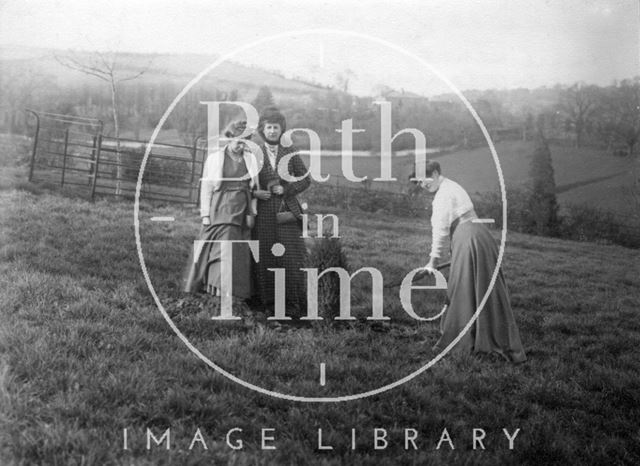 Suffragette Clara Codd planting tree with Annie Kenney and Florence Canning 1909