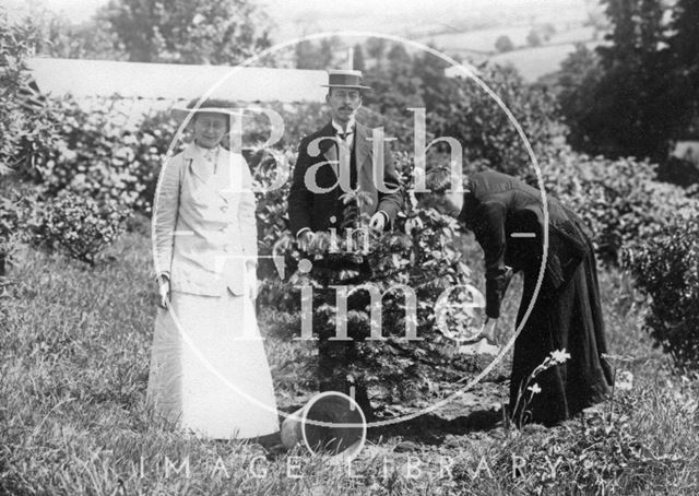 Suffragette Winifred Jones planting tree with Mary Blathwayt and William Blathwayt 1911