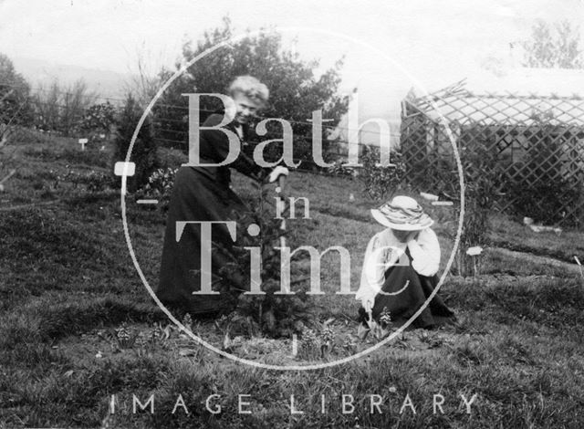 Suffragette Marie Naylor planting tree with Mary Blathwayt 1910